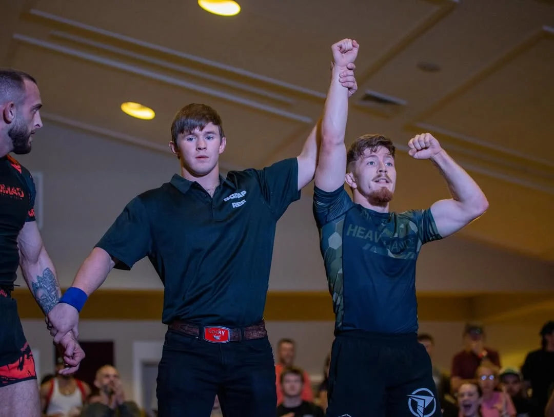 Joseph_Snyder raising his arm in victory 
