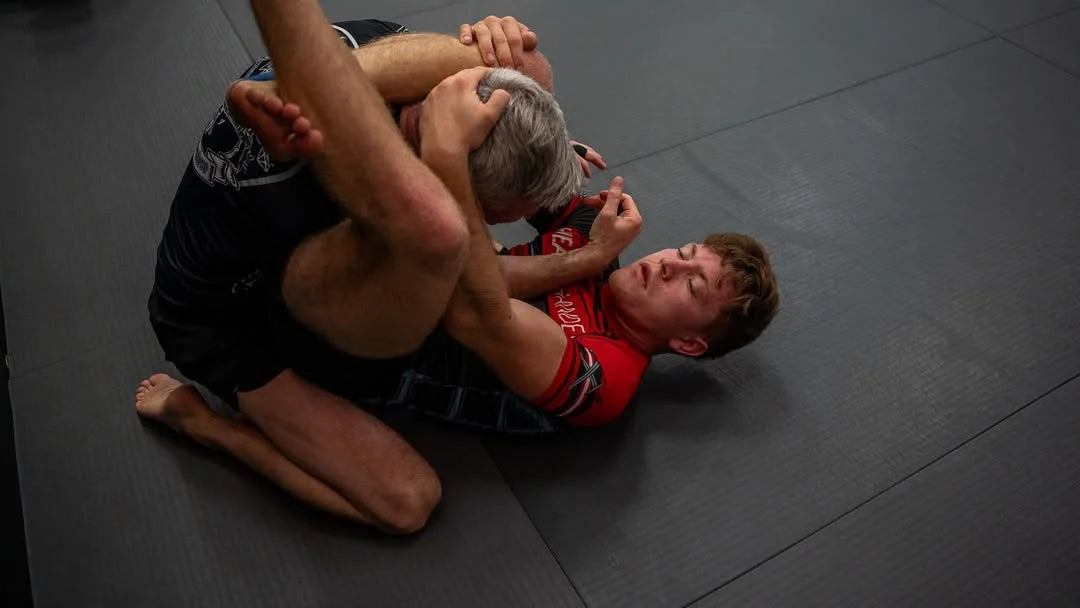 Joseph_Snyder on a dark gray mat 